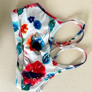 Born primitive medium sports bra.